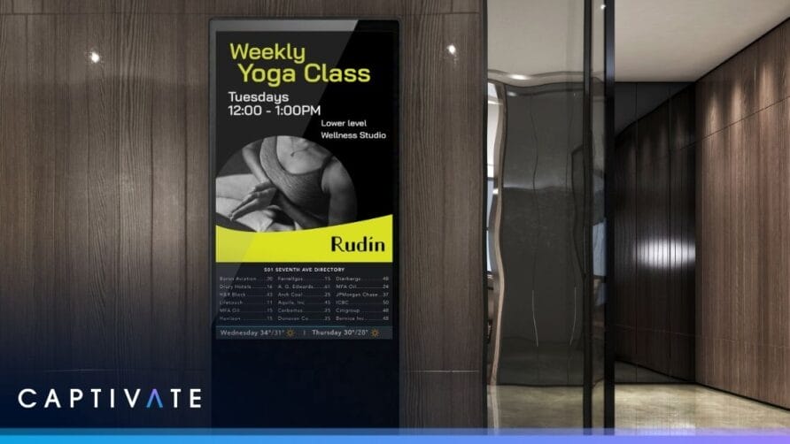 Digital sign advertising a weekly yoga class on Tuesdays at a wellness studio.