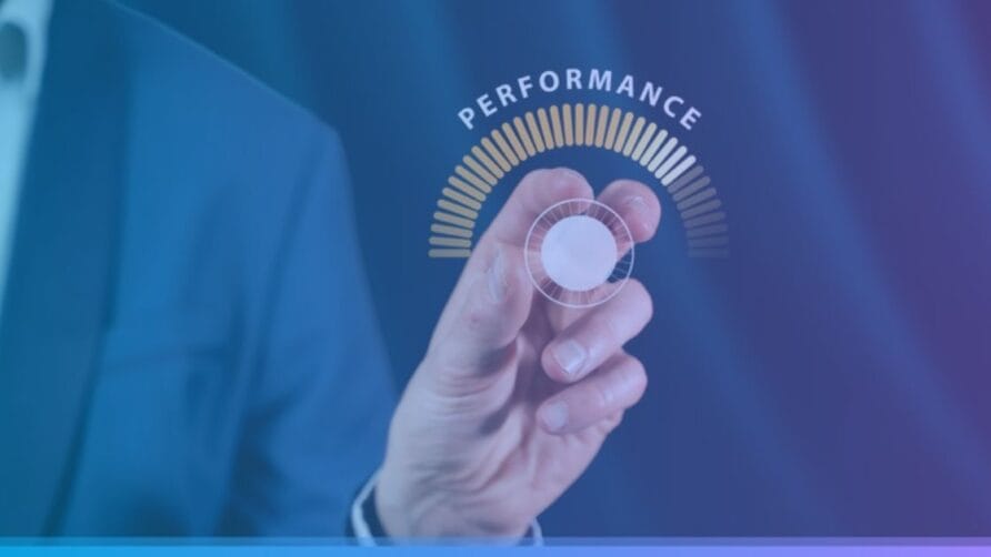 Hand turning dial labeled "Performance," symbolizing optimization and efficiency improvement.