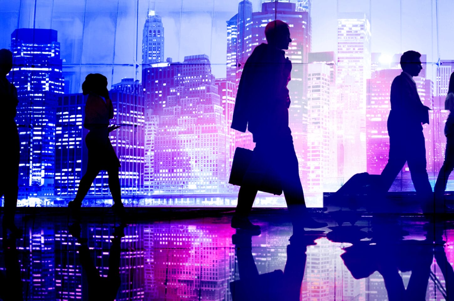Silhouettes of people walking against a colorful cityscape background with reflections on a shiny surface.