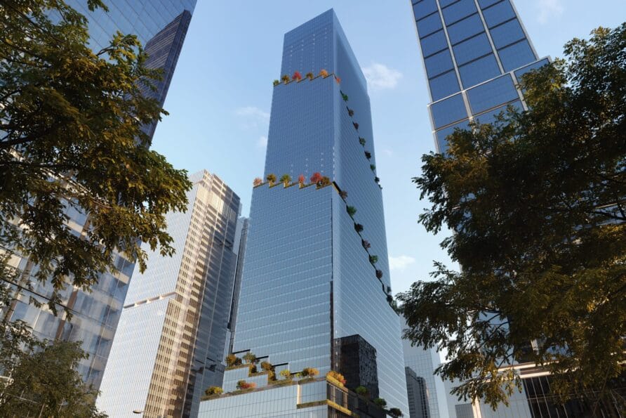 A modern glass skyscraper with surrounding trees and adjacent tall buildings under a clear blue sky.
