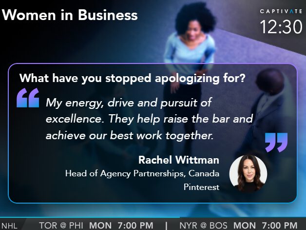 Conference screen showing Rachel Wittman discussing energy, drive, and excellence at a Women in Business event.