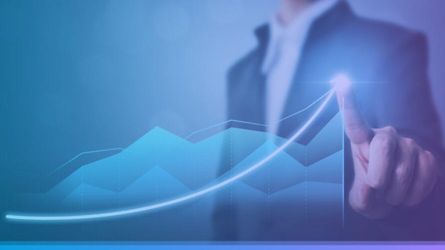 Person pointing at a glowing upward arrow on a virtual graph, symbolizing growth and success in business.