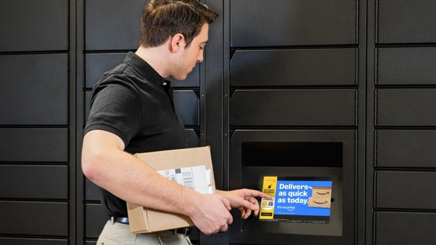 Man using an electronic locker system to pick up a package, with a screen displaying delivery information.
