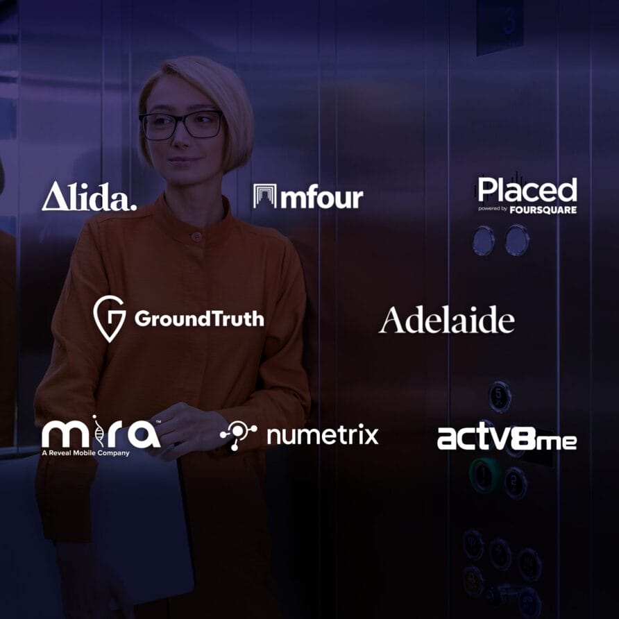Person in elevator with various marketing and analytics company logos on dark background.